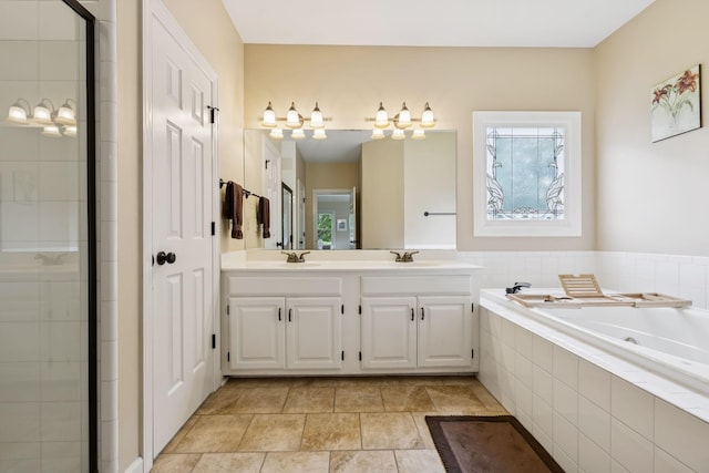 410 Ridge View Ct, Franklin, TN 37067 - bathroom featuring a tub with jets, double vanity, and tiled shower