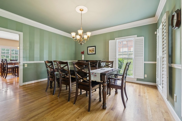 410 Ridge View Ct, Franklin, TN 37067 - dining space featuring a chandelier, wood finished floors, and ornamental molding