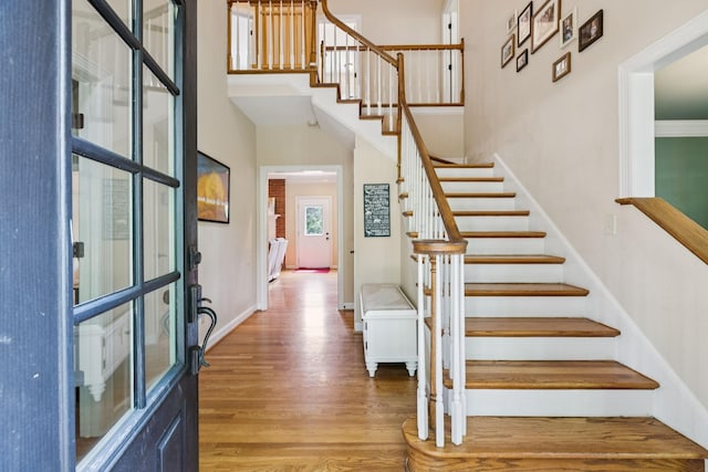 410 Ridge View Ct, Franklin, TN 37067 - foyer entrance with wood finished floors, stairway, and a towering ceiling