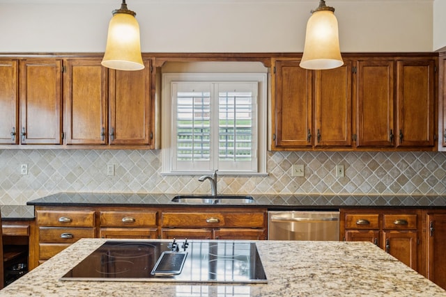 410 Ridge View Ct, Franklin, TN 37067 - kitchen with stainless steel dishwasher, black electric stovetop, pendant lighting, and dark stone countertops