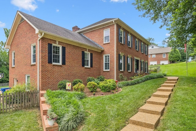 410 Ridge View Ct, Franklin, TN 37067 - view of property exterior featuring brick siding, a chimney, and roof with shingles