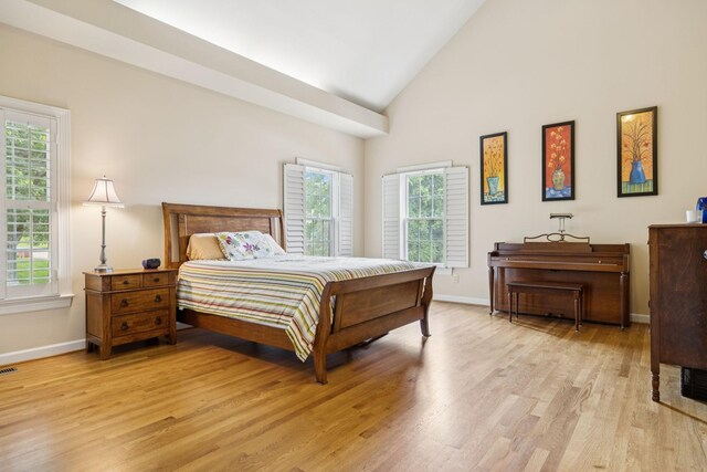410 Ridge View Ct, Franklin, TN 37067 - bedroom featuring light wood-style floors and high vaulted ceiling