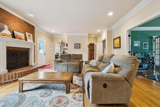 410 Ridge View Ct, Franklin, TN 37067 - living room with wood finished floors, crown molding, recessed lighting, and a fireplace
