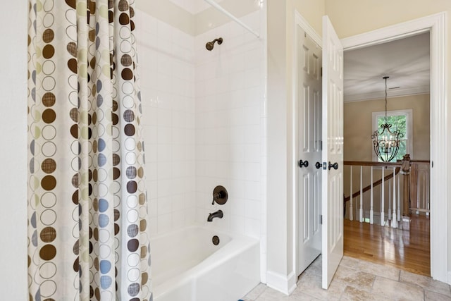410 Ridge View Ct, Franklin, TN 37067 - bathroom featuring shower / bath combination with curtain, a chandelier, and crown molding