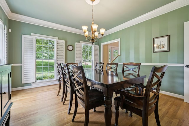 410 Ridge View Ct, Franklin, TN 37067 - dining area featuring a chandelier, ornamental molding, and light wood-style flooring
