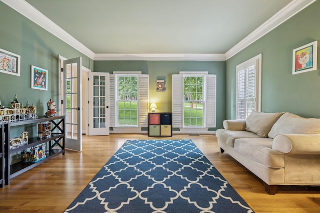 410 Ridge View Ct, Franklin, TN 37067 - living room featuring french doors, plenty of natural light, crown molding, and wood finished floors