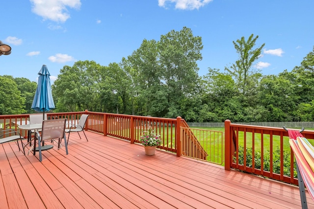 410 Ridge View Ct, Franklin, TN 37067 - deck featuring outdoor dining area and view of wooded area