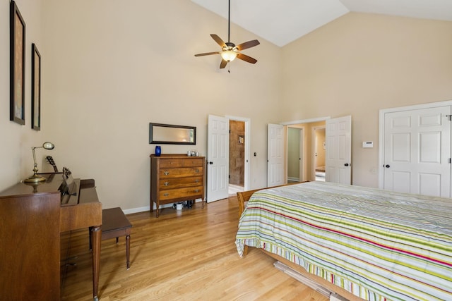 410 Ridge View Ct, Franklin, TN 37067 - bedroom with light wood-style floors and high vaulted ceiling