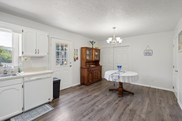 3448 Mahlon Moore Rd, Spring Hill, TN 37174 - kitchen featuring white dishwasher, a chandelier, healthy amount of natural light, a textured ceiling, and white cabinetry