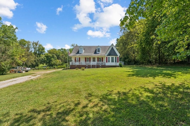 3448 Mahlon Moore Rd, Spring Hill, TN 37174 - new england style home featuring a front yard and covered porch