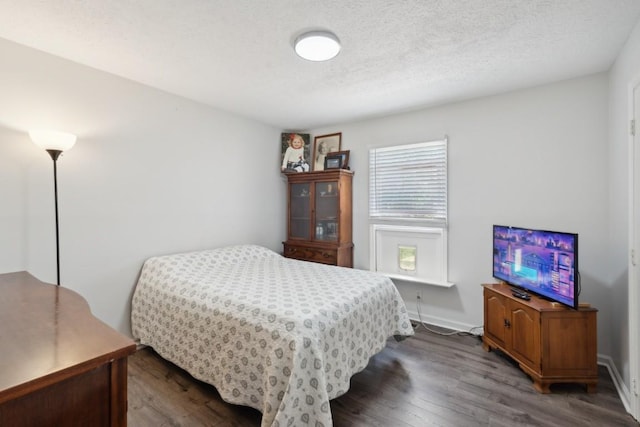 3448 Mahlon Moore Rd, Spring Hill, TN 37174 - bedroom featuring wood finished floors and a textured ceiling