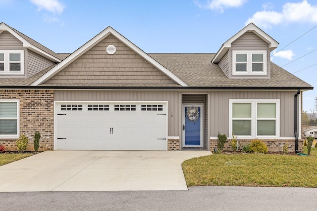 10 Country Rain Ln, Ringgold, GA 30736 - craftsman-style house featuring brick siding, a garage, roof with shingles, and concrete driveway