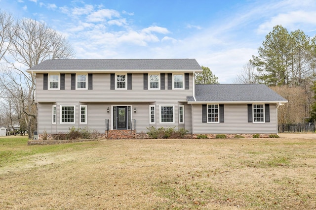 9321 Hopi Trl, Ooltewah, TN 37363 - colonial inspired home featuring a front yard and a shingled roof