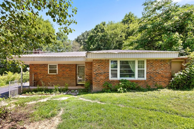 1325 City View St SE, Cleveland, TN 37311 - single story home with brick siding and a metal roof
