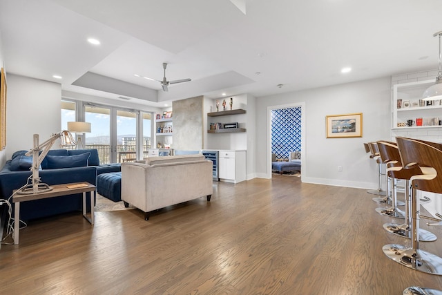 4 Cherokee Blvd Unit 409, Chattanooga, TN 37405 - living area featuring a raised ceiling, ceiling fan, wine cooler, dark wood-style floors, and recessed lighting