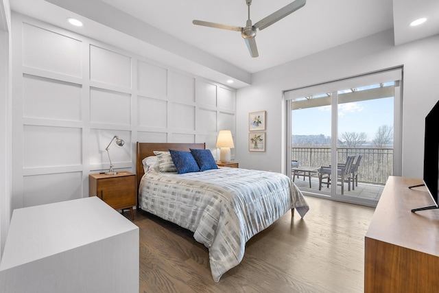 4 Cherokee Blvd Unit 409, Chattanooga, TN 37405 - bedroom featuring access to outside, dark wood-type flooring, recessed lighting, a decorative wall, and ceiling fan