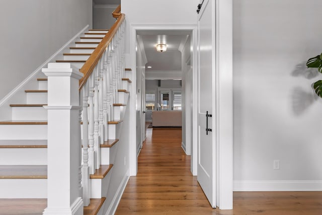 2305 Weeping Willow Dr, Ooltewah, TN 37363 - stairs with wood finished floors and ornamental molding