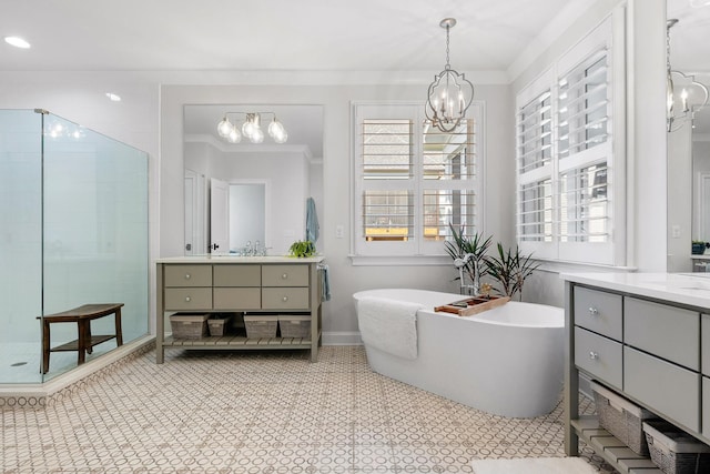 2305 Weeping Willow Dr, Ooltewah, TN 37363 - bathroom featuring a chandelier, two vanities, and a stall shower