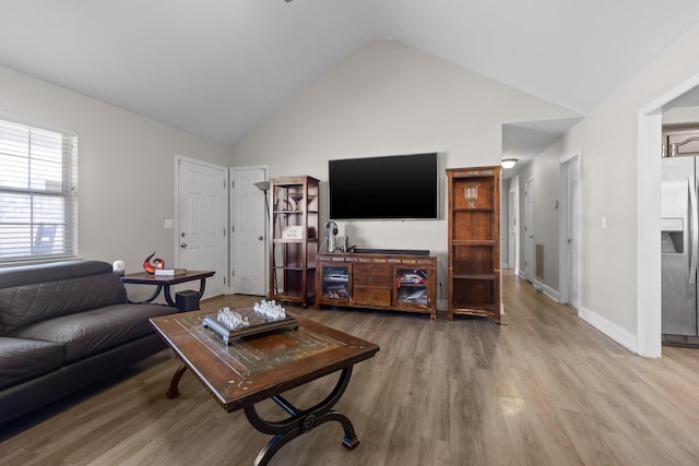 51 Castleview Dr, Ringgold, GA 30736 - living room with light wood finished floors and high vaulted ceiling