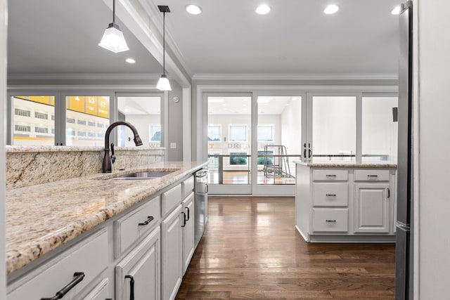 6069 Candies Creek Ridge Rd NW, Charleston, TN 37310 - kitchen with white cabinetry, dark wood-type flooring, light stone counters, ornamental molding, and pendant lighting