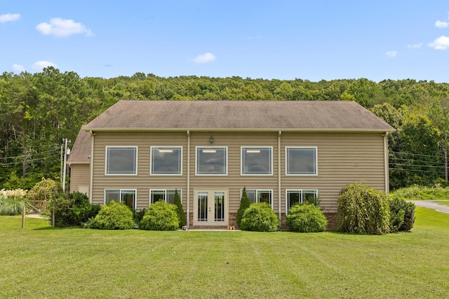 6069 Candies Creek Ridge Rd NW, Charleston, TN 37310 - rear view of house featuring french doors, a lawn, and a wooded view