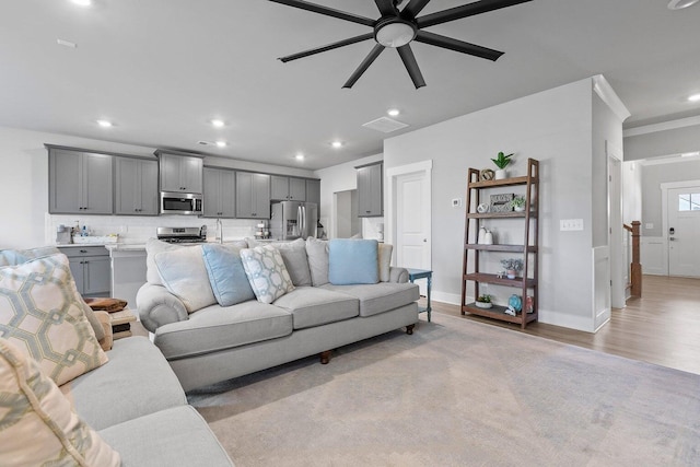 2129 Firelight Way, Ooltewah, TN 37363 - living room featuring ceiling fan, light wood-style flooring, and recessed lighting