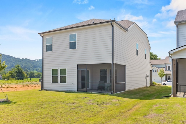 2129 Firelight Way, Ooltewah, TN 37363 - back of property featuring a sunroom and a lawn