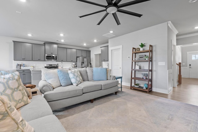 2129 Firelight Way, Ooltewah, TN 37363 - living area with a ceiling fan, recessed lighting, and light wood finished floors