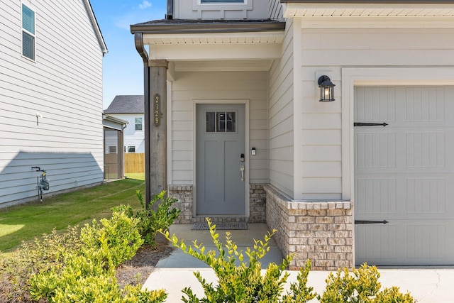 2129 Firelight Way, Ooltewah, TN 37363 - entrance to property with stone siding and a garage