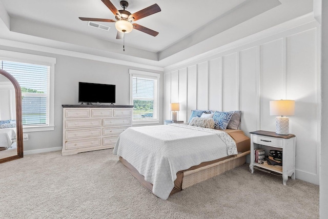 2129 Firelight Way, Ooltewah, TN 37363 - bedroom with a raised ceiling, light carpet, and ceiling fan