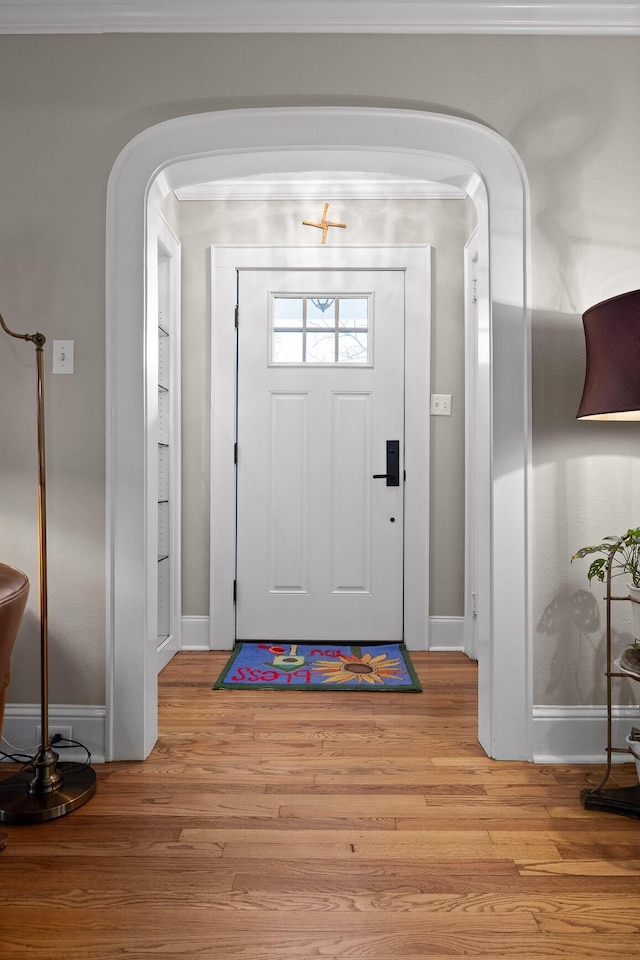 402 Fairview Dr, Dalton, GA 30720 - foyer featuring arched walkways and light wood finished floors