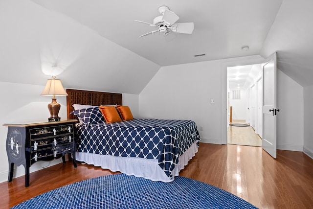 402 Fairview Dr, Dalton, GA 30720 - bedroom featuring wood finished floors, lofted ceiling, and ceiling fan
