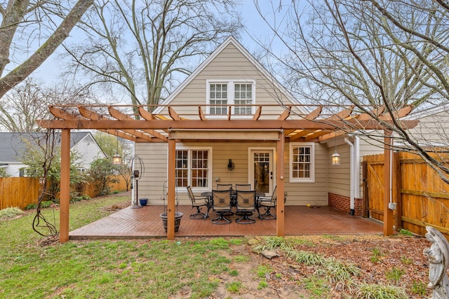 402 Fairview Dr, Dalton, GA 30720 - back of property with a deck, a pergola, a gate, and outdoor dining space
