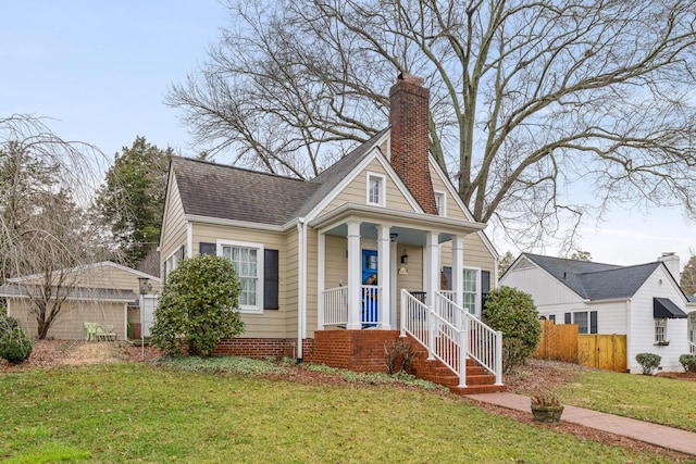 402 Fairview Dr, Dalton, GA 30720 - view of front of house featuring roof with shingles and a chimney