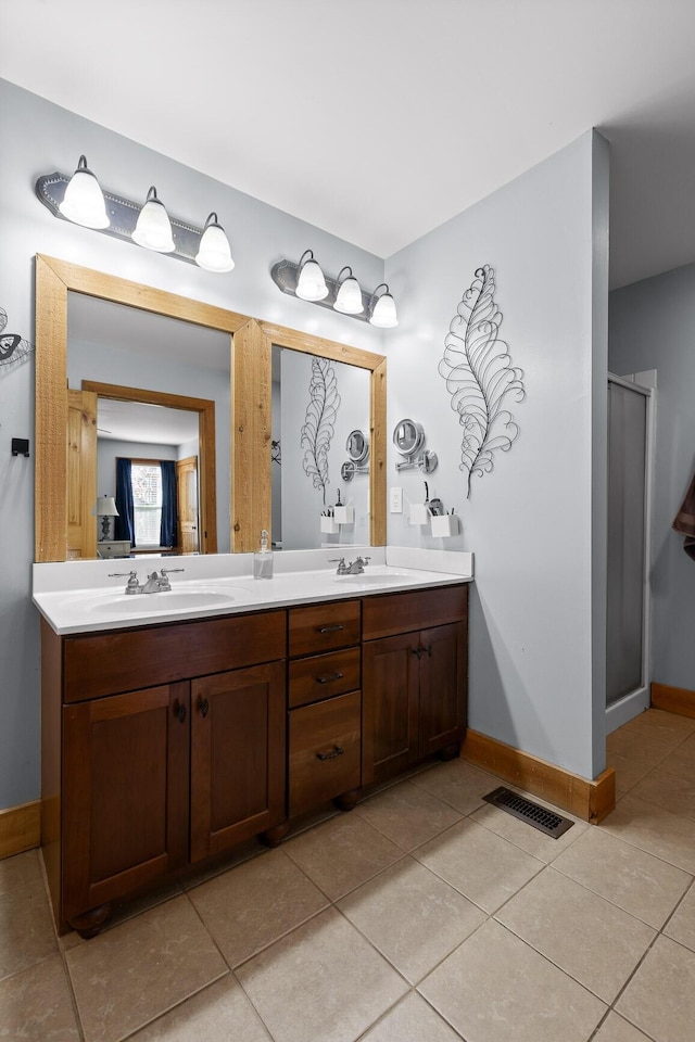 1080 Harp Switch Rd, Chickamauga, GA 30707 - bathroom featuring double vanity, tile patterned flooring, and a stall shower