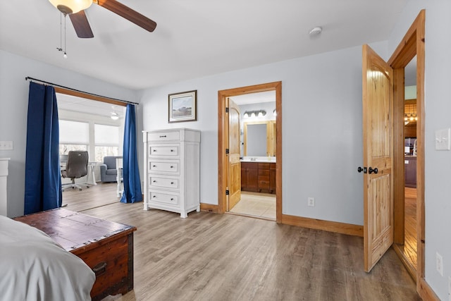 1080 Harp Switch Rd, Chickamauga, GA 30707 - bedroom with light wood-style floors, ensuite bath, and ceiling fan
