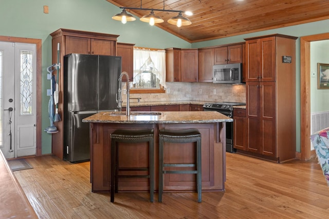 1080 Harp Switch Rd, Chickamauga, GA 30707 - kitchen featuring stainless steel appliances, vaulted ceiling, wood ceiling, light stone counters, and a kitchen island with sink
