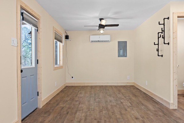 1080 Harp Switch Rd, Chickamauga, GA 30707 - empty room with electric panel, a wall unit AC, wood finished floors, and a ceiling fan