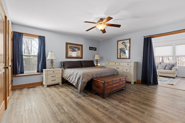 1080 Harp Switch Rd, Chickamauga, GA 30707 - bedroom with wood finished floors, multiple windows, and ceiling fan