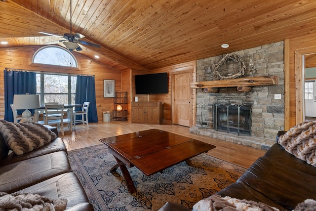 1080 Harp Switch Rd, Chickamauga, GA 30707 - living room with wooden walls, wood ceiling, a ceiling fan, hardwood / wood-style flooring, and a fireplace