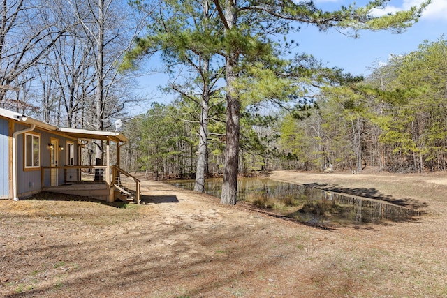 1080 Harp Switch Rd, Chickamauga, GA 30707 - view of yard featuring a wooden deck and a forest view