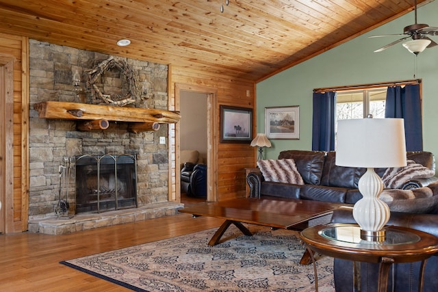 1080 Harp Switch Rd, Chickamauga, GA 30707 - living area with vaulted ceiling, wood finished floors, ceiling fan, wooden ceiling, and a fireplace