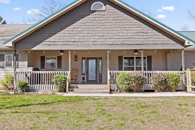 1080 Harp Switch Rd, Chickamauga, GA 30707 - view of front facade with ceiling fan, a front lawn, and a porch