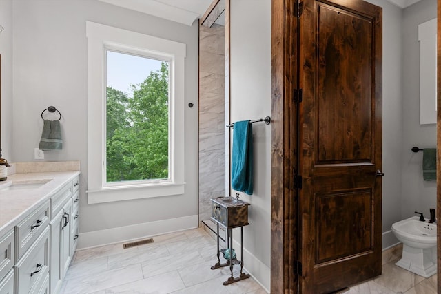 6835 Jasper Highlands Blvd, Jasper, TN 37347 - bathroom featuring a bidet, vanity, healthy amount of natural light, and marble finish flooring