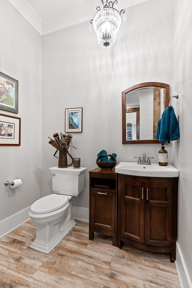 6835 Jasper Highlands Blvd, Jasper, TN 37347 - half bathroom with vanity, wood finished floors, and a chandelier