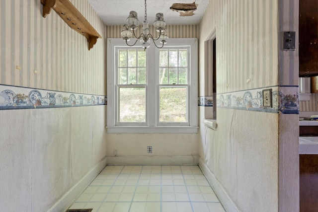 20 Ridge Rd, Chattanooga, TN 37411 - unfurnished dining area with wallpapered walls, a chandelier, and wainscoting