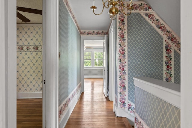 20 Ridge Rd, Chattanooga, TN 37411 - corridor featuring wood finished floors, wallpapered walls, and a chandelier
