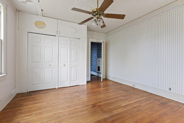 20 Ridge Rd, Chattanooga, TN 37411 - unfurnished bedroom with light wood finished floors, a closet, and a ceiling fan