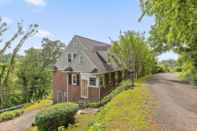 20 Ridge Rd, Chattanooga, TN 37411 - view of front facade featuring brick siding and stucco siding