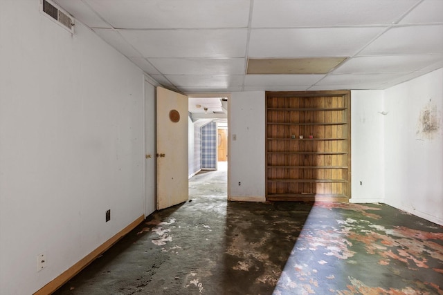 20 Ridge Rd, Chattanooga, TN 37411 - spare room with built in features, concrete floors, and a drop ceiling